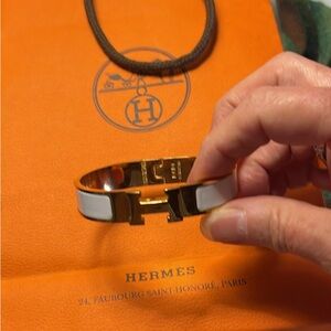 Hermès Gold and White Cuff Bracelet